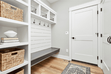 professional-home-organizer-moore-ok-our-most-common-faqs-and-answers-well-organized-mudroom-with-vertical-storage-bench-bins-and-hooks-for-staying-organized-confidential