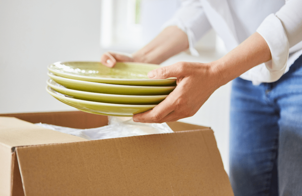 pretty-neat-edmond-ok-tips-for-unpacking-and-packing-person-unpacking-plates