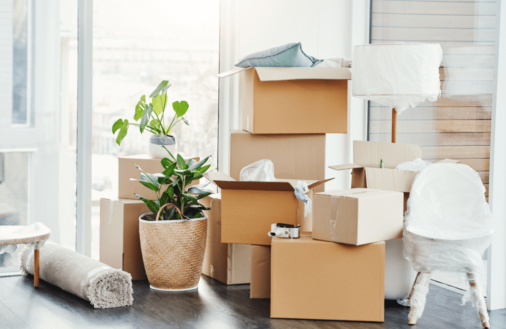 pretty-neat-oklahoma-city-ok-tips-for-unpacking-and-packing-stack-of-boxes-and-furnishings-ready-for-moving