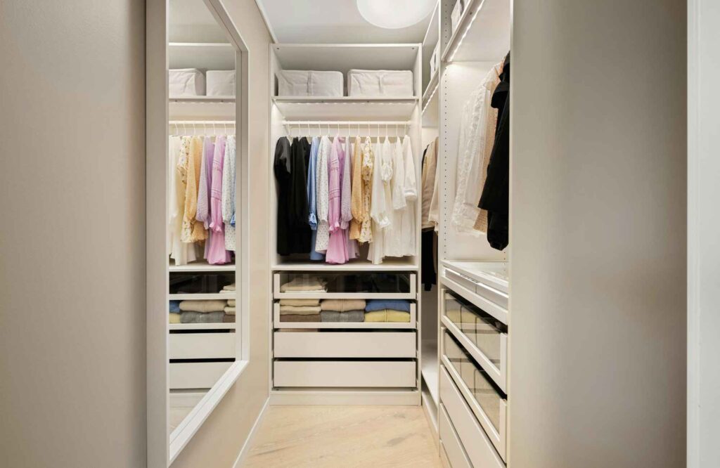 professional-home-organizing-gaillardia-country-club-ok-home-organizing-process-narrow-closet-with-mirror-neat-and-tidy-womens-clothes-calm