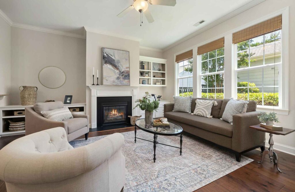 professional-home-organizing-yukon-ok-letting-go-of-belongings-comfortable-living-room-large-windows-timeless-furnishings-neat-tidy-calm