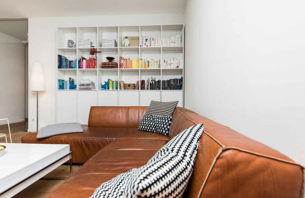 pretty-neat-yukon-ok-story-behind-clutter-leather-sectional-sofa-bookcase-organized-by-color-well-being-closet-organization