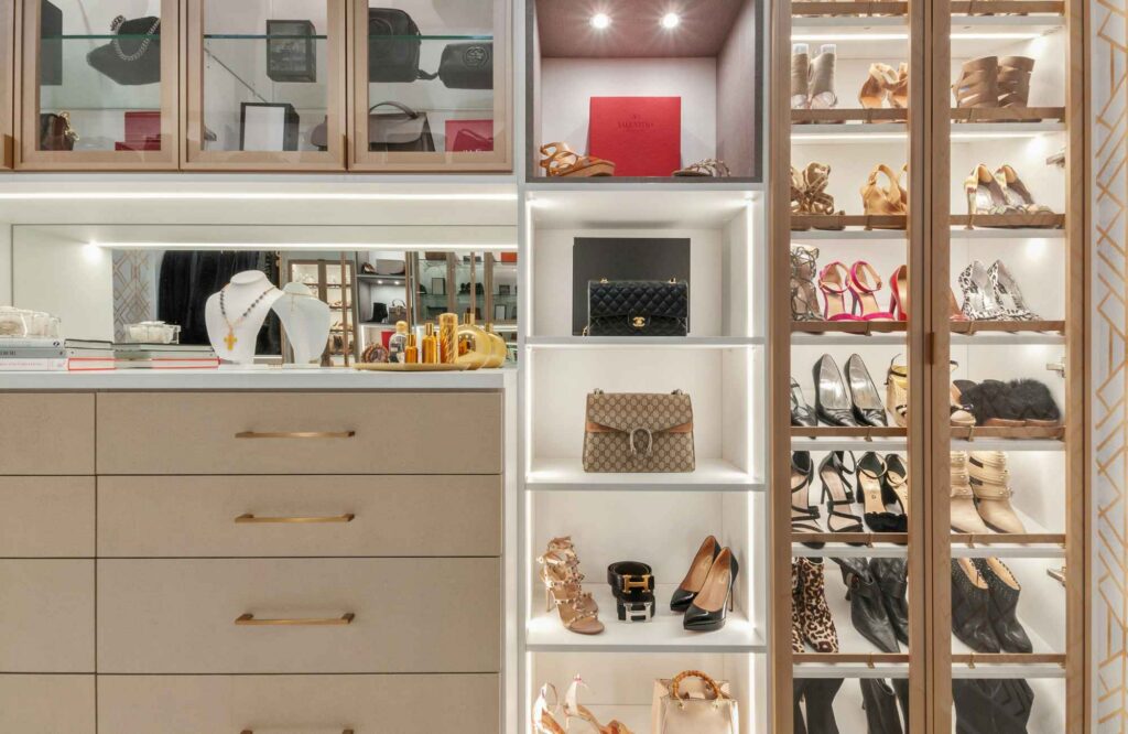 professional-home-organizer-norman-ok-story-behind-clutter-well-organized-closet-with-drawers-shelves-for-shoes-and-purses-well-lit-comfortable