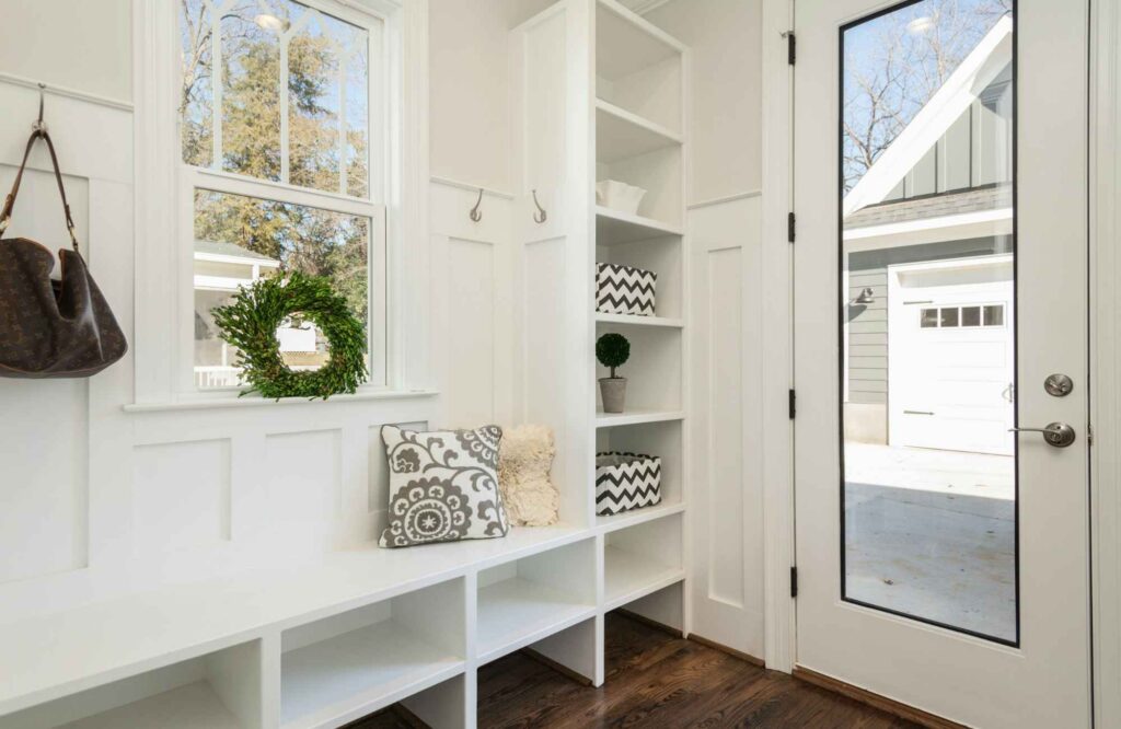 professional-home-organizing-moore-ok-story-behind-clutter-mudroom-with-built-in-shelves-bench-cubbies-for-coat-hooks-reduce-stress