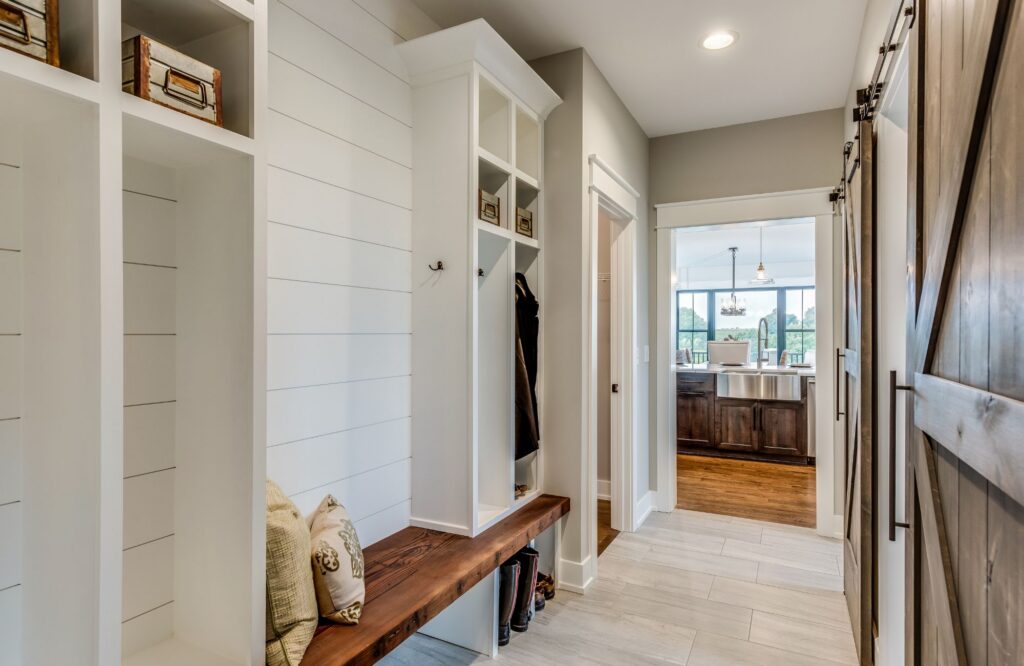 pretty-neat-edmond-ok-functional-drop-zones-mudroom-with-shiplap-built-in-cabinets-and-cubbies-bench-baskets-for-storage-well-being-closet-organization