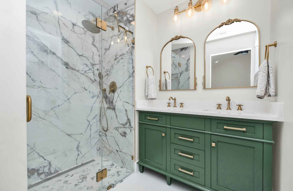 pretty-neat-gaillardia-country-club-ok-shared-bathroom-organizing-emerald-green-vanity-large-slab-stone-shower-arched-mirrors-well-being-move-management