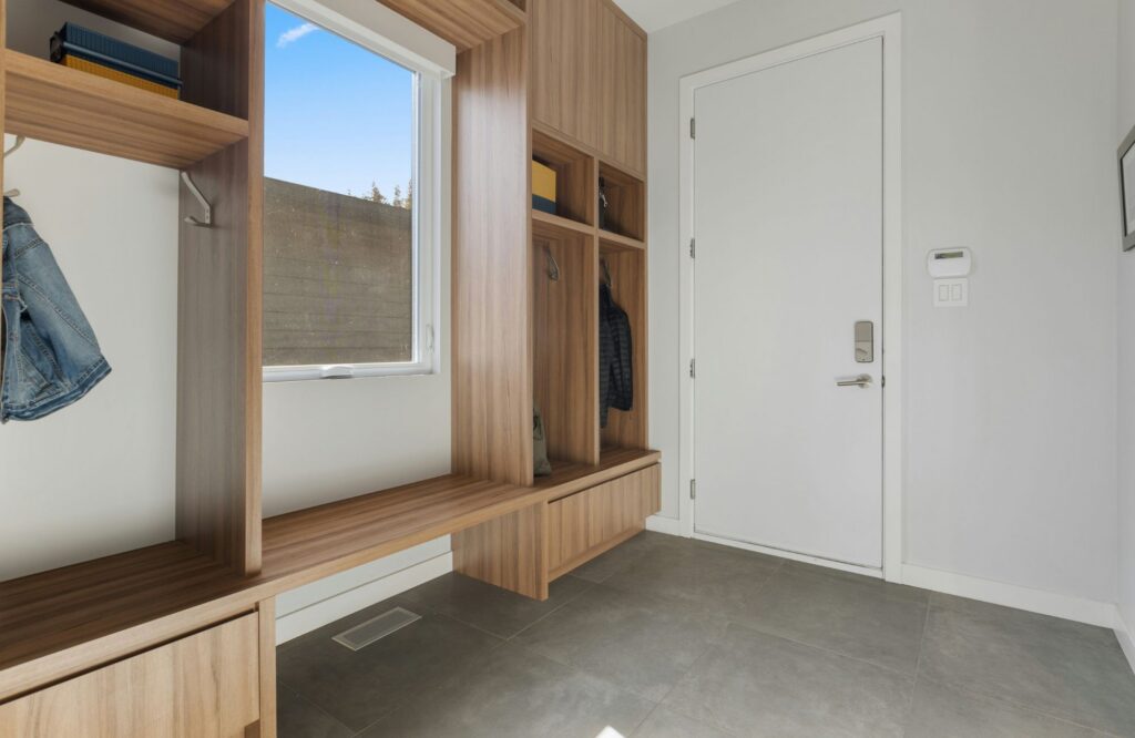 professional-home-organizing-yukon-ok-functional-drop-zones-mudroom-with-built-in-cabinets-by-window-cubbies-bench-and-shelves-confidential-office-organization